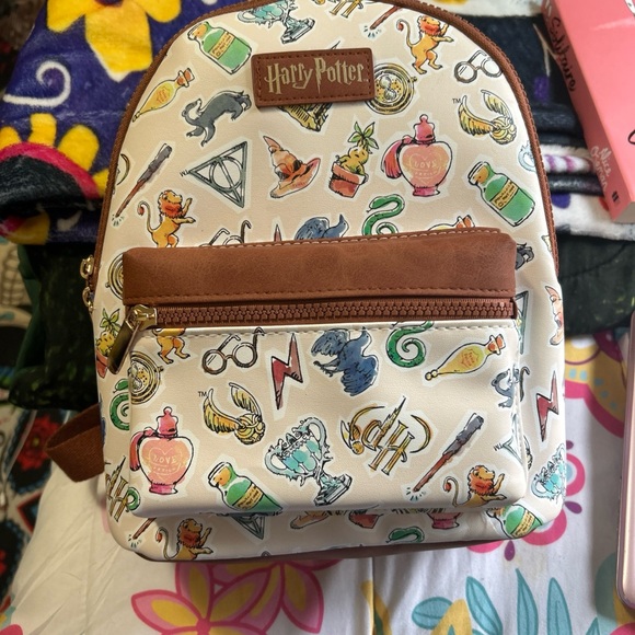 Warner Bros. Harry Potter Diagon Alley Canvas Backpack in Cream and Brown Trim Loungefly Harry Potter Diagon Alley Canvas Rucksack  main image 3